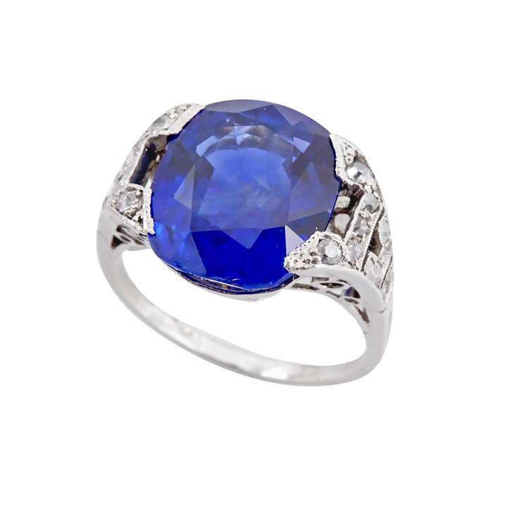 Cushion cut sapphire and diamond ring, set with a Burma sapphire, of approximately 6.50ct,